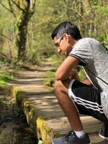 DEEP THOUGHTS Senior Sumeet Hiray reflects upon the past four years. Hiray takes long walks in the nearby park as he sorts through his thoughts. Hiray says, “We have all changed so much since freshman year. It is as if we are different people now.”